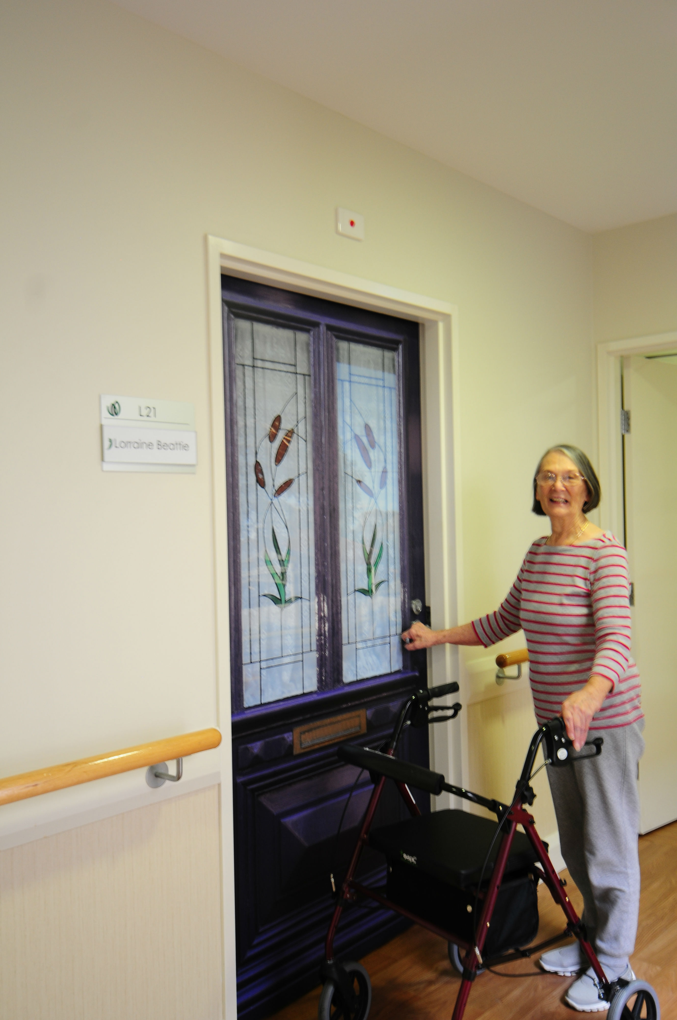 Lorraine enjoying her True Door at TLC Aged Care The Heights in Donvale Victoria Australia