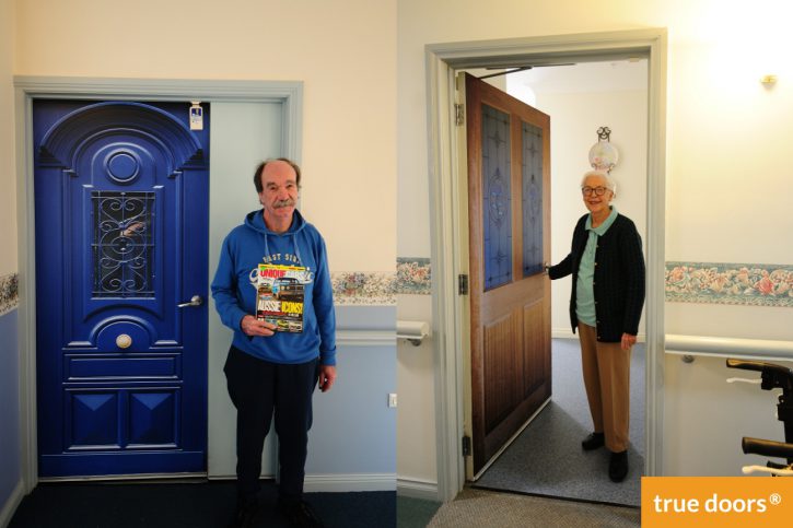 Mark Byrnes (left) and Joan Smith (right) next to their True Doors at Cypress View Lodge Australia